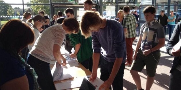 Boys at St Birinus School lining up to get their results