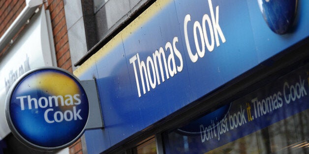 A branch of Thomas Cook is pictured in Birkenhead, in north-west England, on November 22, 2011. Shares in Thomas Cook crashed 67 percent on Tuesday as the British travel firm said it was renegotiating its debts and delaying the group's annual results after a sharp deterioration in business. Thomas Cook's share price slumped 67.19 percent to 13.48 pence in midday trade on London's second-tier FTSE 250 shares index. AFP PHOTO / PAUL ELLIS (Photo credit should read PAUL ELLIS/AFP/Getty Images)