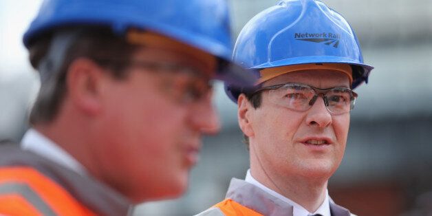 MANCHESTER, ENGLAND - JUNE 23: British Prime Minister David Cameron and British Chancellor George Osborne (R) tour building works at Manchester's Victoria Station which is being upgraded on June 23, 2014 in Manchester, England. Chancellor George Osborne earlier spoke of a proposed HS3 high-speed rail link between Manchester and Leeds that would help build a 'northern global powerhouse' linking cities in the North of England. (Photo by Christopher Furlong - WPA Pool /Getty Images)