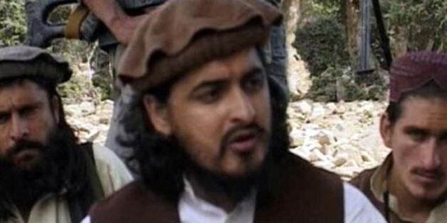 Pakistani Taliban chief Hakimullah Mehsud, pictured sitting with other militants in South Waziristan in 2009, was killed in an American drone strike