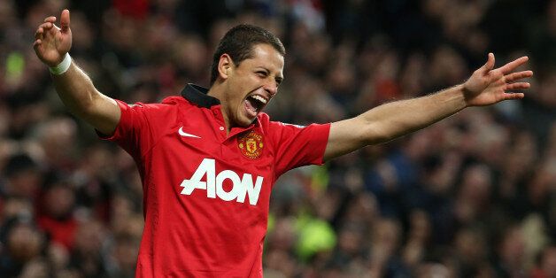 MANCHESTER, ENGLAND - OCTOBER 29: Javier 'Chicharito' Hernandez of Manchester United celebrates scoring their second goal during the Capital One Cup Fourth Round match between Manchester United and Norwich City at Old Trafford on October 29, 2013 in Manchester, England. (Photo by Matthew Peters/Man Utd via Getty Images)