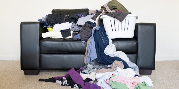 Messy pile of clothes on the sofa