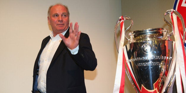 MUNICH, GERMANY - JUNE 04: Uli Hoeness, President of FC Bayern Muenchen stand next to the Championa League winners trophy after a press conference at Allianz Arena on June 4, 2013 in Munich, Germany. (Photo by Alexander Hassenstein/Bongarts/Getty Images)