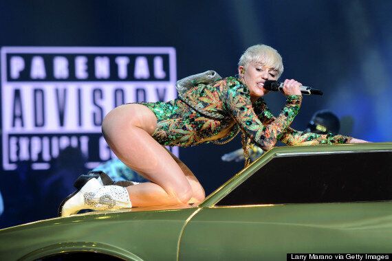 Miley Cyrus Bangerz Tour Twerking Singer Spits Water At Fans During