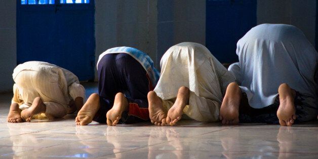 Muslim Students Say Friday Prayers In The Rain After Room Shortage At QMUL