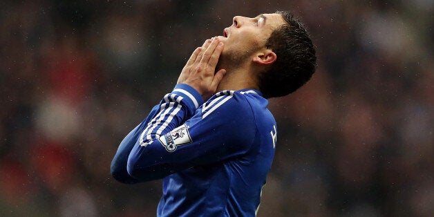 Chelseas Belgian midfielder Eden Hazard reacts during the English Premier League football match between Newcastle United and Chelsea at St James' Park in Newcastle-upon-Tyne, northeast England on November 2, 2013. Newcastle won the game 2-0. AFP PHOTO / IAN MACNICOLRESTRICTED TO EDITORIAL USE. No use with unauthorized audio, video, data, fixture lists, club/league logos or live services. Online in-match use limited to 45 images, no video emulation. No use in betting, games or single club/league/