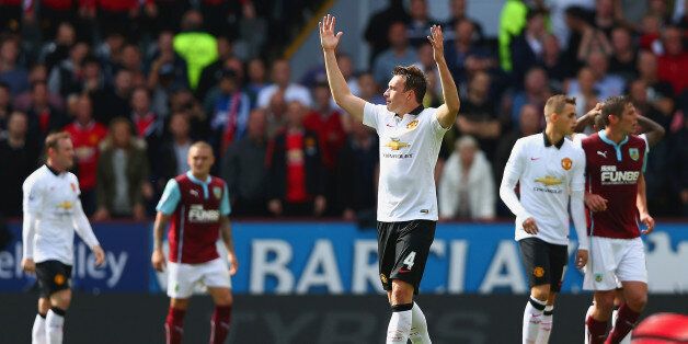 BURNLEY, ENGLAND - AUGUST 30: Phil Jones of Manchester United shows his frustration during the Barclays Premier League match between Burnley and Manchester United at Turf Moor on August 30, 2014 in Burnley, England. (Photo by Clive Brunskill/Getty Images)