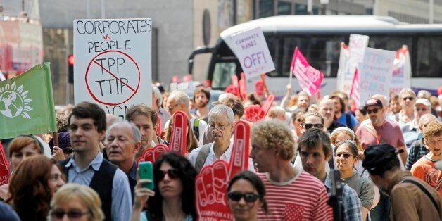 12/07/2014 - Protestors against the EU-US trade deal (TTIP - Transatlantic Trade and Investment Partnership) march from the Department for Business, Innovation and Skills to Europe House, the London Headquarters of the European Commission and the European Parliament, in Smith Square, London.