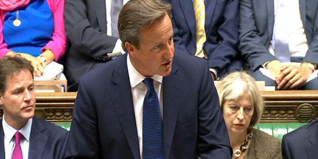 Prime Minister David Cameron speaks n the House of Commons, London.