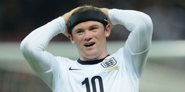 LONDON, ENGLAND - OCTOBER 15: Wayne Rooney of England reacts during the FIFA 2014 World Cup Qualifying Group H match between England and Poland at Wembley Stadium on October 15, 2013 in London, England. (Photo by Michael Regan - The FA/The FA via Getty Images)