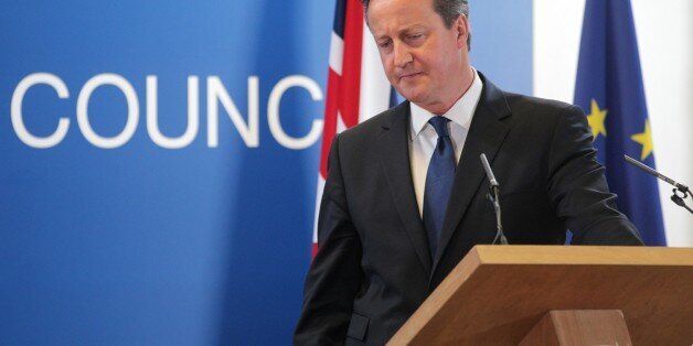 British Prime Minister David Cameron pauses before speaking during a media conference after an EU summit in Brussels on Friday, June 27, 2014. European Union leaders have nominated former Luxembourg Prime Minister Jean-Claude Juncker to become the 28-nation blocâs new chief executive. Junckerâs nomination is breaking with a decades-old tradition of choosing the Commission president by consensus because Britain opposed him. (AP Photo/Yves Logghe)