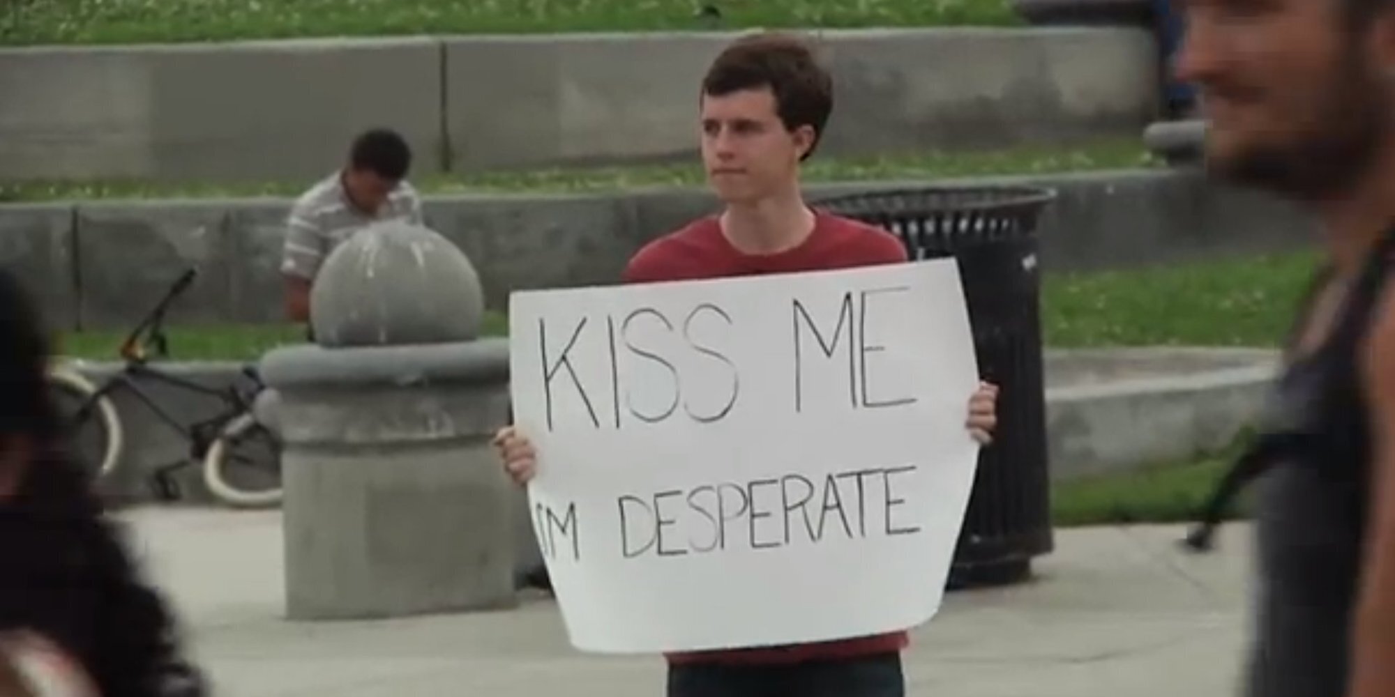 Does Holding A Sign Saying ‘Kiss Me, I'm Desperate' Work? (VIDEO ...