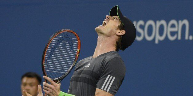 Andy Murray of Great Britain reacts to a point against Novak Djokovic of Serbia during their US Open 2014 men's quarterfinals match at the USTA Billie Jean King National Center September 3, 2014 in New York. AFP PHOTO/Don Emmert (Photo credit should read DON EMMERT/AFP/Getty Images)