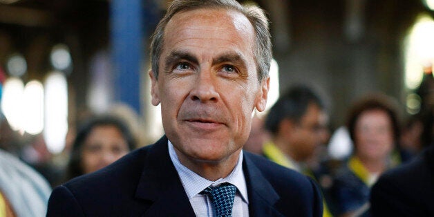 Mark Carney, governor of the Bank of England, sits and listens during the Commonwealth Games Business Conference in Glasgow, U.K., on Wednesday, July 23, 2014. With less than two months to go before the Sept. 18 referendum on independence, the pound remains a key area of contention along with Scotland's membership of the European Union, pensions and social security spending. Photographer: Simon Dawson/Bloomberg via Getty Images