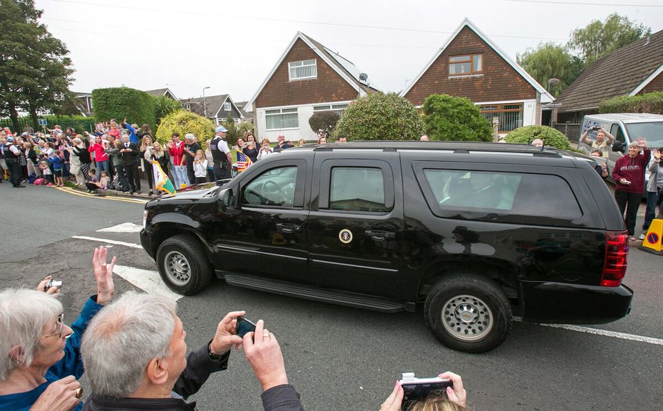 Bystanders cheer as Obama arrives in Newport