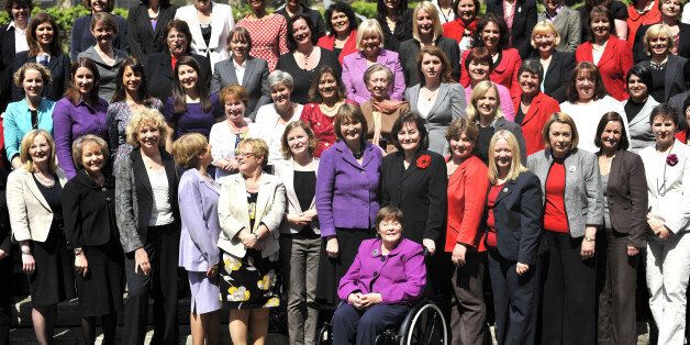 Most of the Labour Party's female MPs, including Harriet Harman (centre) gather on the steps to New Palace Yard outside the Member's Entrance to the House of Commons before they enter as the House sits for the first time since the General Election.