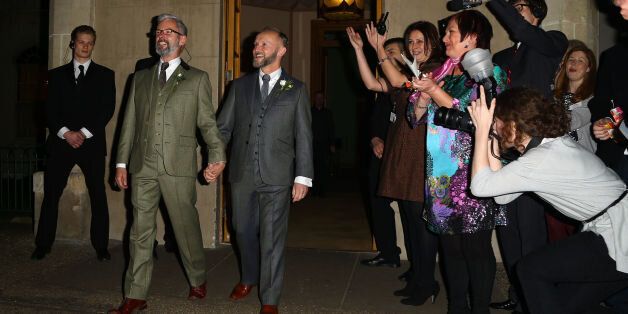 Actor Andrew Wale (left) and guesthouse owner Neil Allard following their wedding service in the Music Room of the Royal Pavilion, Brighton, as the new law permitting same sex marriage in England and Wales comes into force.