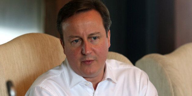 COLOMBO, SRI LANKA - NOVEMBER 16: United Kingdom Prime Minister David Cameron attends the Heads of State meeting at Waters Edge on November 16, 2013 in Colombo, Sri Lanka. The biannual Commonwealth Heads of Government Meeting (CHOGM) is taking place from November 15-17, amid pressure from human rights groups urging leaders to boycott the summit until Sri Lanka further investigates charges of war crimes. Both the Canadian Prime Minister, Stephen Harper and Indian Prime Minister, Manmohan Signh h