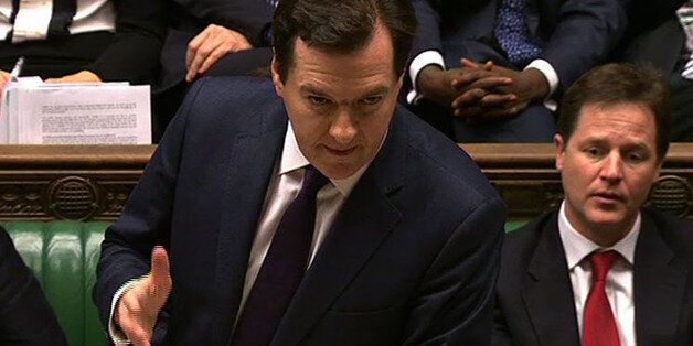 In an image grab from pooled video footage taken on December 5, 2012 British Chancellor of the Exchequer George Osborne (L) deliver the Autumn budget statement in the House of Commons in central London on December 5, 2012 as British Deputy Prime Minister Nick Clegg (R) listens. Osborne warned Britons that they faced an extra year of austerity measures and insisted that reversing his belt-tightening measures now would be a 'disaster'. RESTRICTED TO EDITORIAL USE - MANDATORY CREDIT ' AFP PHOTO /
