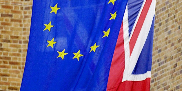 File photo dated 09/01/09 of the Union flag behind the European Union flag as manufacturers have sent the Government a strong message that the UK should remain part of the European Union to help secure jobs and economic growth.