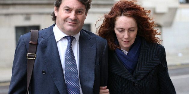 LONDON, ENGLAND - FEBRUARY 28: Former News International chief executive Rebekah Brooks and her husband Charlie Brooks leave the Old Bailey on February 28, 2014 in London, England. Former government director of communications and News Of The World editor Andy Coulson and former News International chief executive Rebekah Brooks, along with six others, face a series of charges linked to the phone hacking of celebrities and others at the now-defunct newspaper. (Photo by Peter Macdiarmid/Getty Ima