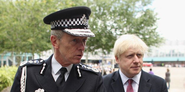 HENDON, ENGLAND - JUNE 29: Metropolitan Police Commissioner Bernard Hogan-Howe (L) and Mayor of London Boris Johnson give an interview before newly qualified Metropolitan police officers take part in their Passing out Parade at Hendon Police Training College on June 29, 2012 in Hendon, England. The ceremony, which was overseen by the Metropolitan Police Commissioner Bernard Hogan-Howe and Mayor of London Boris Johnson, was the largest ever Passing out Parade with 567 Specials and PCSOs becomin