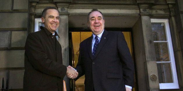 Bank of England governor Mark Carney (left) meeting Scottish First Minister Alex Salmond as he arrives at Bute House in Edinburgh for face-to-face talks for the first time.