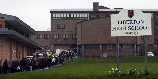A Liberton High School pupil has died after a wall inside her school collapsed onto her