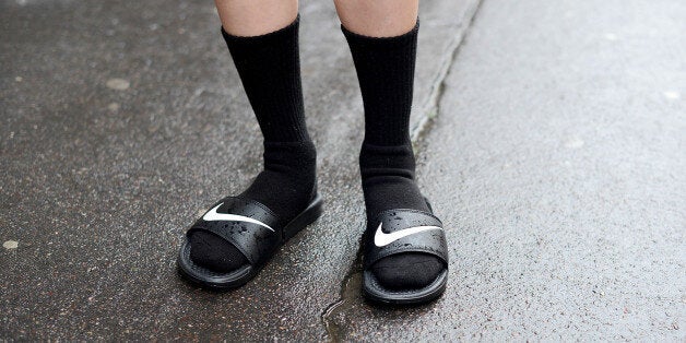 PARIS, FRANCE - JULY 09: Model Ming Xi wears Nike slides after Vionnet show after the Vionnet show on July 9, 2014 in Paris, France. (Photo by Vanni Bassetti/Getty Images)