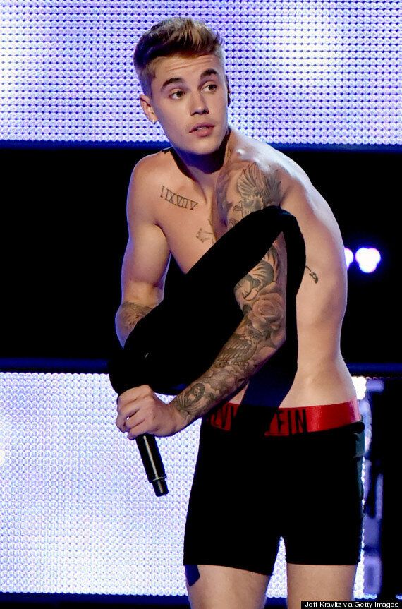 Justin Bieber Strips To His Calvin Klein Underwear, Shows Off