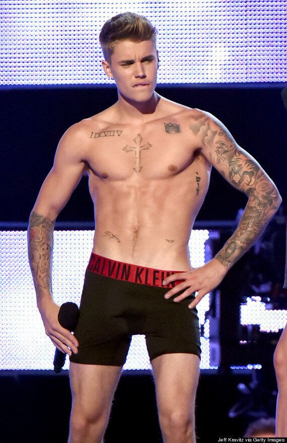 Justin Bieber Strips To His Calvin Klein Underwear, Shows Off