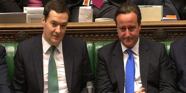 Chancellor of the Exchequer George Osborne and Prime Minister David Cameron listen as Shadow Chancellor Ed Balls responds to the Autumn Statement delivered to MP's by George Osborne in the House of Commons, central London.