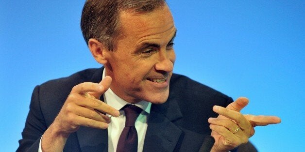 Bank of England governor Mark Carney answers questions after addressing the annual TUC Congress in Liverpool, northwest England, on September 9, 2014. Carney hinted in his speech to union leaders that the bank could raise its main interest rate from a record-low level in early 2015, citing the country's solid economic recovery. AFP PHOTO/PAUL ELLIS (Photo credit should read PAUL ELLIS/AFP/Getty Images)