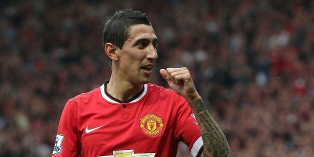 MANCHESTER, ENGLAND - SEPTEMBER 14: Angel di Maria of Manchester United celebrates scoring their first goal during the Barclays Premier League match between Manchester United and Queens Park Rangers at Old Trafford on September 14, 2014 in Manchester, England. (Photo by Matthew Peters/Man Utd via Getty Images)