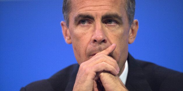 Mark Carney, governor of the Bank of England, listens during the annual meeting of the Trades Union Congress (TUC) in Liverpool, U.K., on Tuesday, Sept. 9, 2014. Carney signaled Bank of England officials will probably increase their benchmark rate from a record low in spring next year as wage growth accelerates and the recovery gains momentum. Photographer: Simon Dawson/Bloomberg via Getty Images