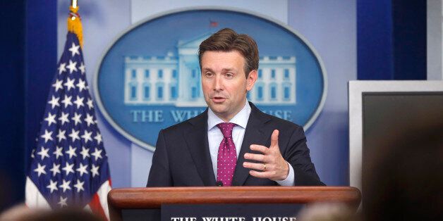 White House press secretary Josh Earnest answers questions from reporters during the daily press briefing at the White House in Washington, Wednesday, July 16, 2014. Earnest took questions on the Middle East, Iran, Ukraine, and immigration. (AP Photo/Charles Dharapak)