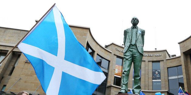 The Donald Dewar statue with a Yes sticker in Buchanan Street, Glasgow, ahead of the Scottish independence referendum that takes place tomorrow.