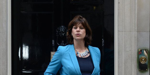 Claire Perry a junior transport minister leaves Downing Street, London, as Prime Minister David Cameron puts his new ministerial team in place.