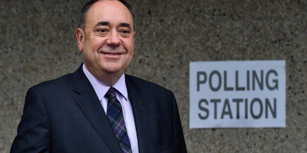 Scotland's First Minister Alex Salmond poses after casting his vote at a polling station in Strichen, Aberdeenshire, on September 18, 2014, during Scotland's independence referendum. Polling booths opened on Thursday in Scotland's historic referendum on independence, with record numbers of Scots expected to cast their vote on whether to stay or leave the United Kingdom. AFP PHOTO / BEN STANSALL (Photo credit should read BEN STANSALL/AFP/Getty Images)