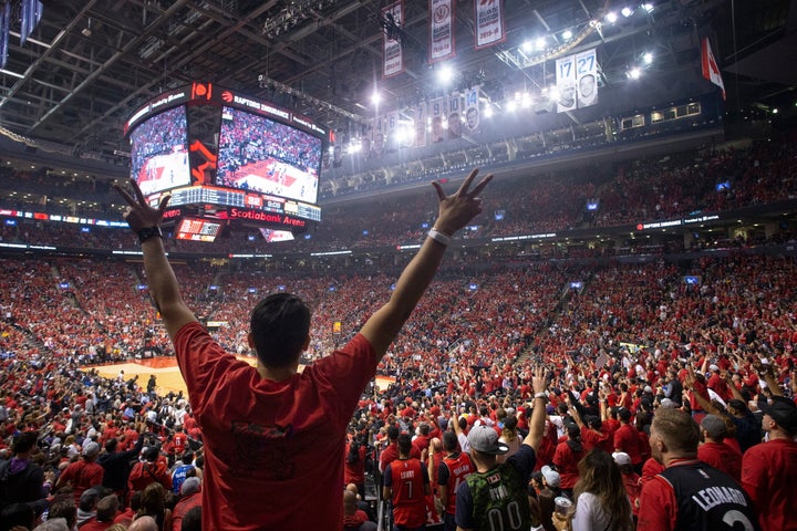 Toronto Raptors fans cheer at the Scotiabank Arena in Toronto, Ontario.