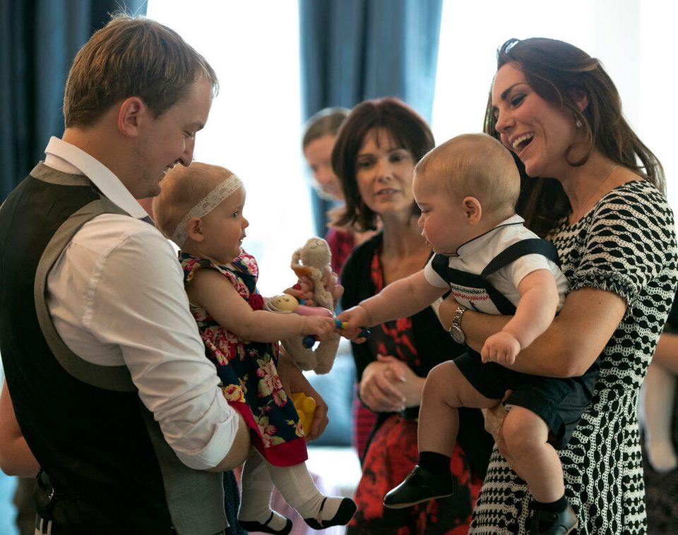 Prince George meets his nemesis and makes his first subtle attempt to grab her toy.