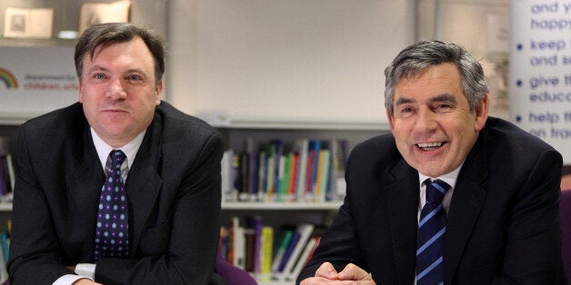 Prime Minister Gordon Brown and Secretary of State for Children, Schools and Families Ed Balls meet school children from St Monica's Primary School in Hackney, east London, who receive one-to-one tuition in maths and English, in the offices of the Department of Children, Schools and Families, London.