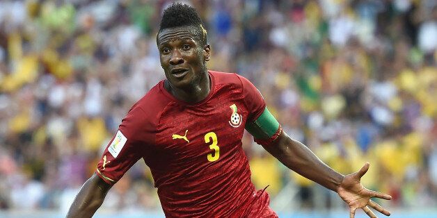 FORTALEZA, BRAZIL - JUNE 21: Asamoah Gyan of Ghana celebrates scoring his team's second goal during the 2014 FIFA World Cup Brazil Group G match between Germany and Ghana at Castelao on June 21, 2014 in Fortaleza, Brazil. (Photo by Laurence Griffiths/Getty Images)