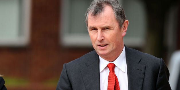Former deputy speaker of the House of Commons Nigel Evans arrives at Preston Crown Court where he faces nine charges, dating from 2002 to April 1, last year of sexual offences against seven men.