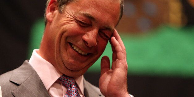 UK Independence Party leader Nigel Farage smiles as he hears the results during the European Parliamentary elections count at the Guildhall in Southampton, Hampshire.