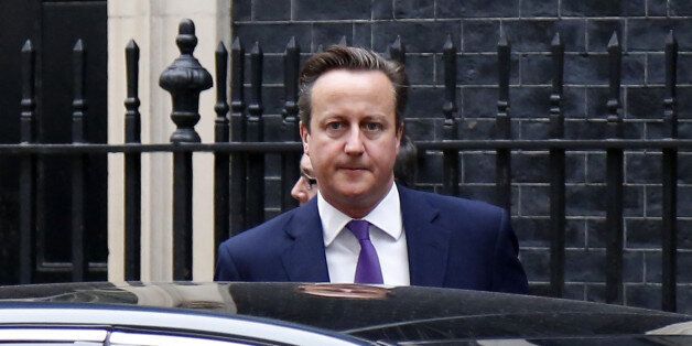 LONDAN, UNITED KINGDOM - SEPTEMBER 26: David Cameron Prime Minister of the United Kingdom departs from Downing Street ahead of a parliamentary debate on the UK joining air strikes against ISIL in Iraq in Londan, United Kingdom on September 26, 2014. (Photo by Yunus Kaymaz / Anadolu Agency / Getty Images)