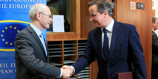 BRUSSELS, BELGIUM - MARCH 6: European Council President Herman Van Rompuy (L) shakes the hand of Prime Minister of the United Kingdom David Cameron (R) before an emergency summit about the situation in Ukraine at the European Union Council Building in Brussels, Belgium, on March 6, 2014. (Photo by Dursun Aydemir/Anadolu Agency/Getty Images)