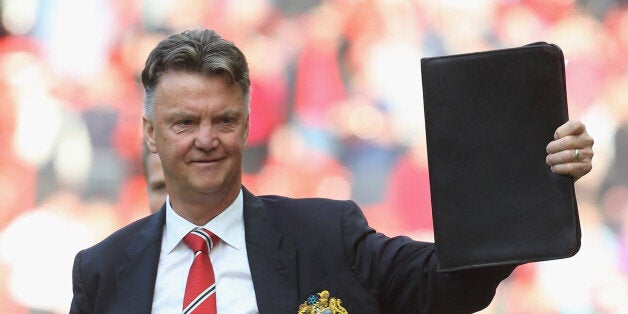 MANCHESTER, ENGLAND - SEPTEMBER 27: Manager Louis van Gaal of Manchester United walks off after the Barclays Premier League match between Manchester United and West Ham United at Old Trafford on September 27, 2014 in Manchester, England. (Photo by John Peters/Man Utd via Getty Images)