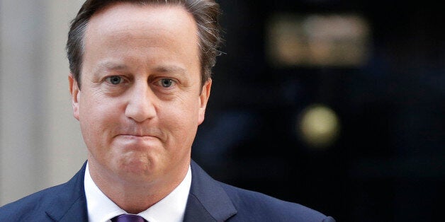 British Prime Minister David Cameron leaves after giving a statement to the media about Scotland's referendum results, outside his official residence at 10 Downing Street in central London, Friday, Sept. 19, 2014. Scottish voters have rejected independence, deciding to remain part of the United Kingdom after a historic referendum that shook the country to its core. The decision prevented a rupture of a 307-year union with England, bringing a huge sigh of relief to the British political establishment. (AP Photo/Lefteris Pitarakis)