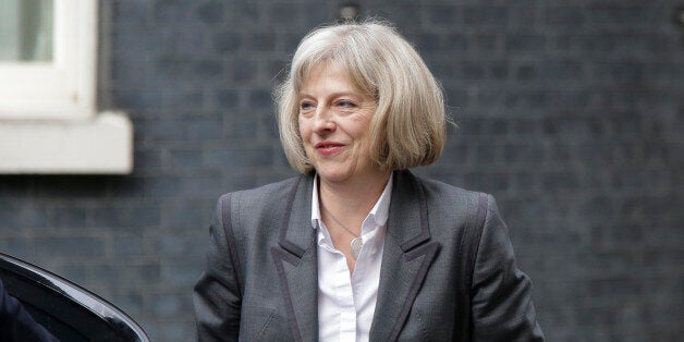 Britain's Home Secretary Theresa May arrives at British Prime Minister David Cameron's official residence at 10 Downing Street in central London, Thursday, Sept. 18, 2014. Polls have opened across Scotland in a referendum that will decide whether the country leaves its 307-year-old union with England and becomes an independent state. (AP Photo/Lefteris Pitarakis)